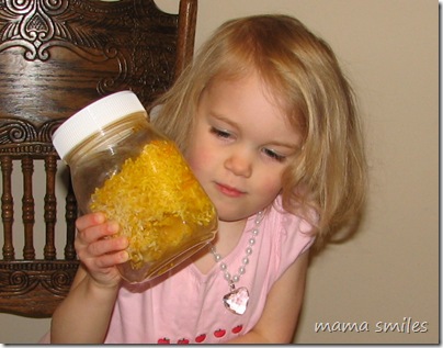 adding food coloring to the rice
