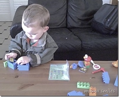 Johnny playing with KNEX