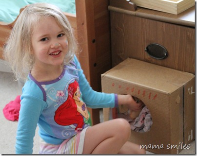 emma with her cardboard box washer/dryer
