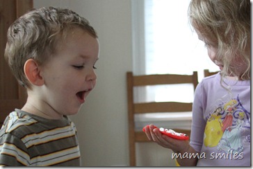 Johnny admires googley-eyed play dough