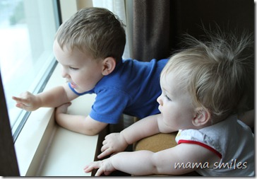 Johnny and Lily look out the window