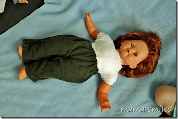 Step 5: Add elastic, stitch ends of elastic together, and try on doll