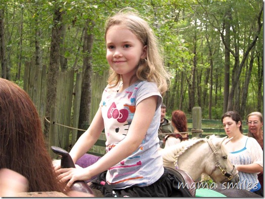 Emma rides a pony at King Richard's Renaissance Faire