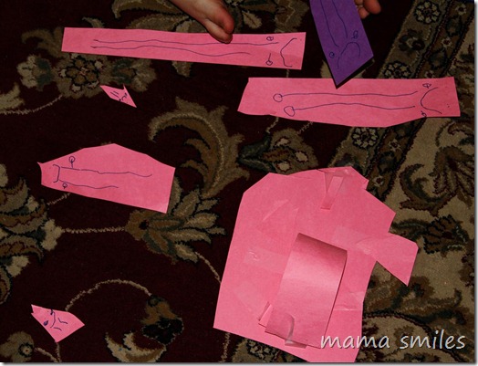 two-year-old people and house from construction paper