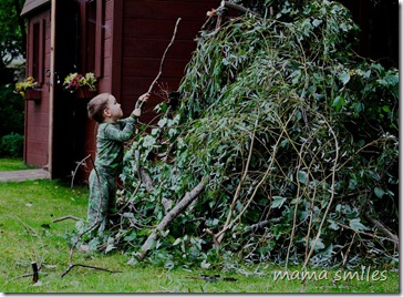 Johnny adds finishing touches to our teepee