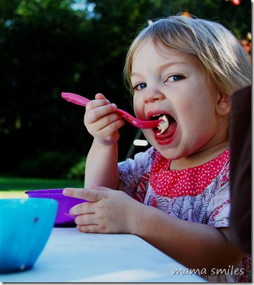 Lily enjoys ice cream outside