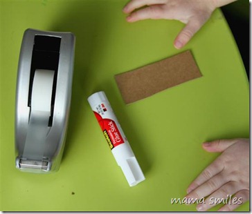 tape, glue stick, and cardboard scrap - project materials