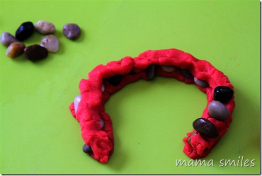 creative sensory play with play dough and rocks