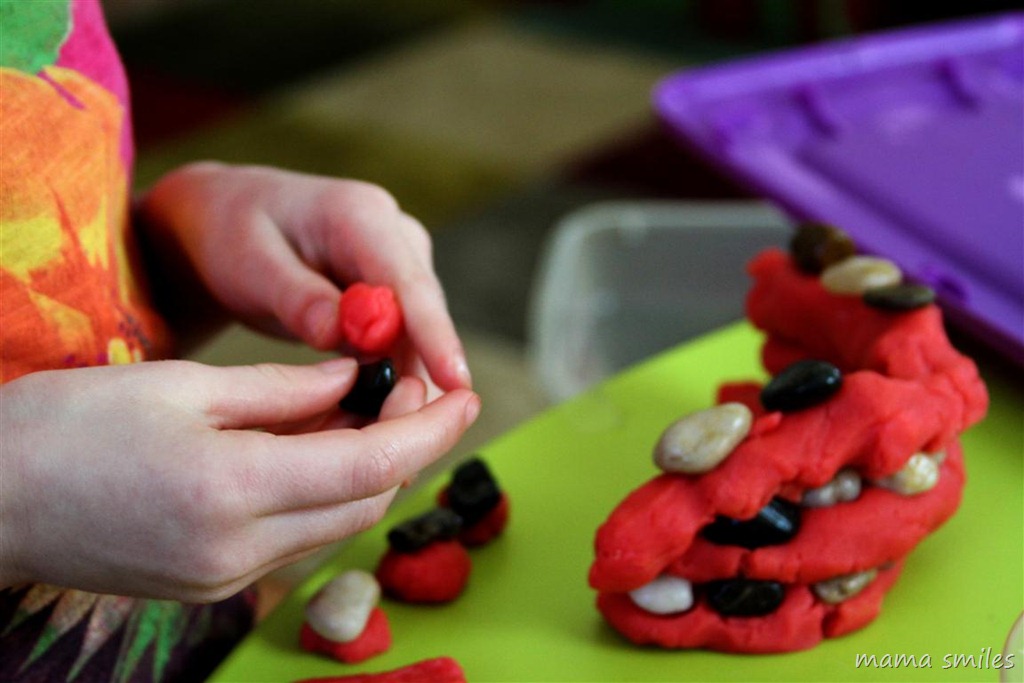sensory play with play dough and rocks from mama smiles