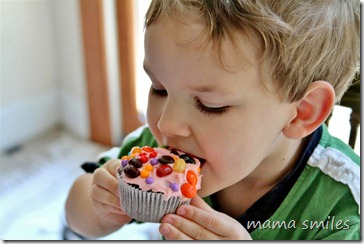 Johnny bites into his decorated cupcake