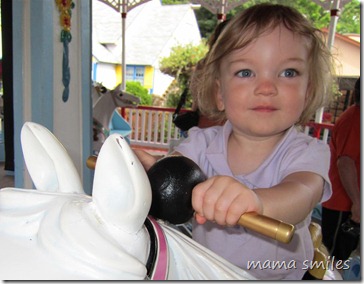 Lily riding the antique German carousel