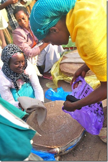 101511Ethiopia_woman_selling_injera