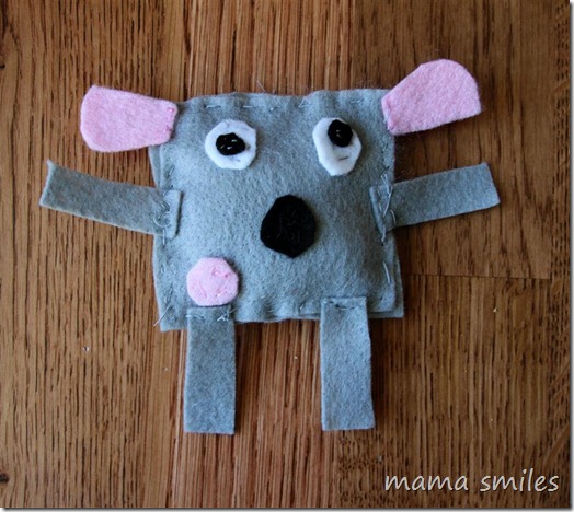 child-sewn felt puppy