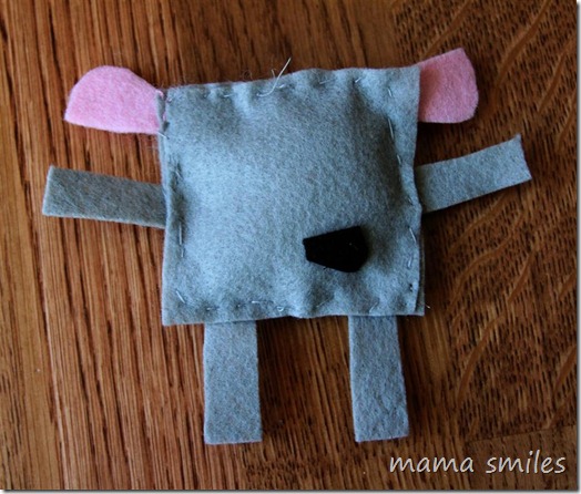 child-sewn felt puppy