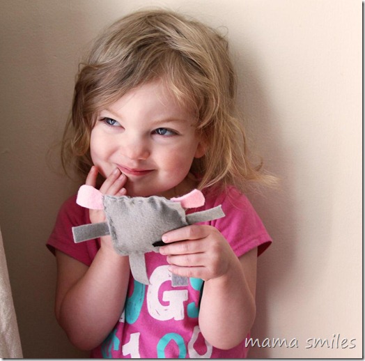 Lily with her hand-sewn gift from her sister