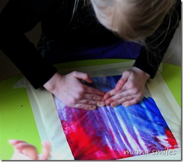 Emma mixing colors in a ziploc bag