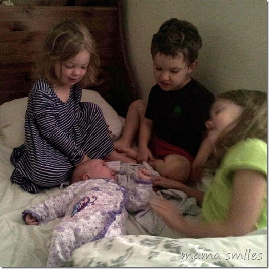 Lots of love for baby from her older siblings
