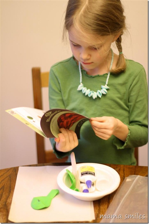 reading Babbabox instructions for a papier mache moon nightlight