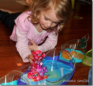 Emma plays with Xia-Xia pets