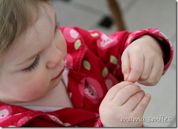 Lily examines a tree bud