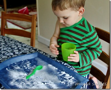 Johnny pours vinegar onto baking soda