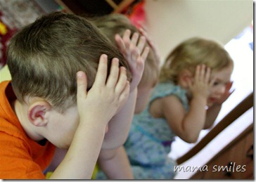 All three kids "pat, pat, pat" their heads to The Tuneables DVD