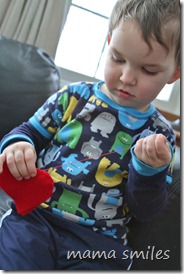 Johnny sewing a felt heart