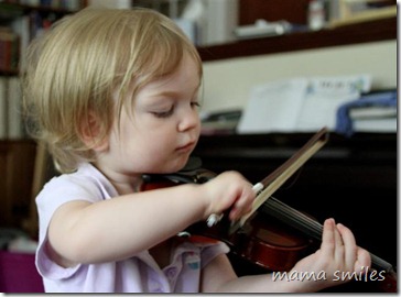 Lily plays her violin