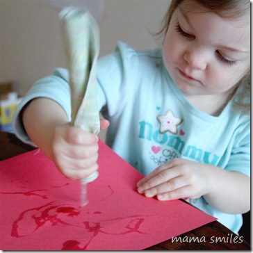 painting with an icicle on construction paper