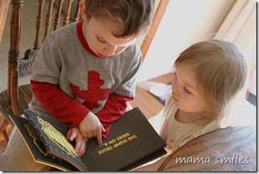 siblings reading together