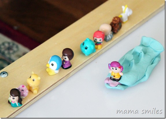 creative play with play dough and squinkies